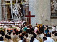 Youths hand over the cross of the World Youth Day to organizers of the next edition that will be held in Seoul, South Korea, in 2027, during...