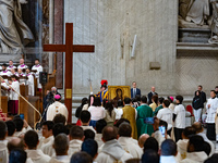 Youths hand over the cross of the World Youth Day to organizers of the next edition that will be held in Seoul, South Korea, in 2027, during...