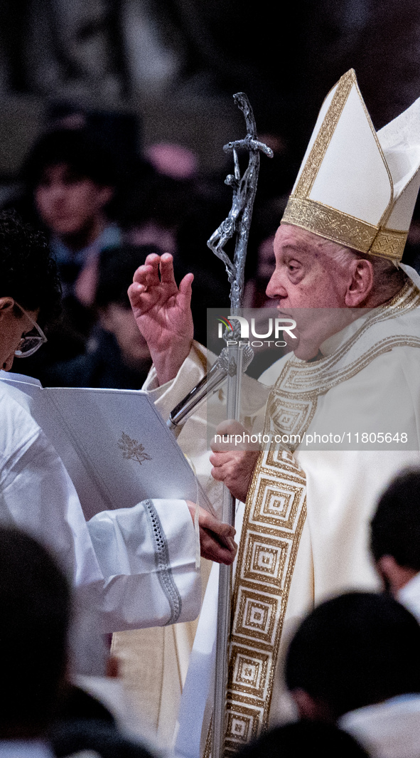 Pope Francis blesses a believer during a mass on World Youth Day at St. Peter's Basilica in The Vatican, on November 24, 2024. 