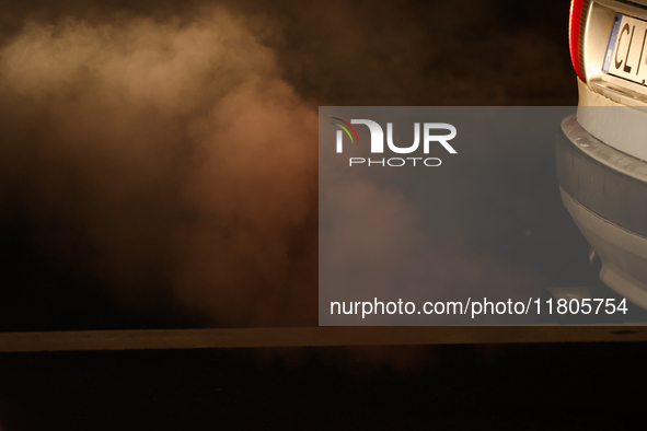 Exhaust fumes from the  car exhaust pipe are seen in Torun, Poland on November 23, 2024. 