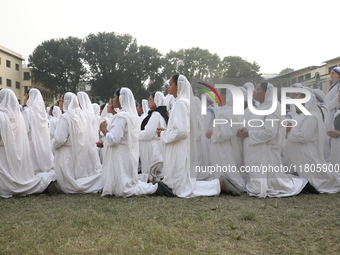 Catholic nuns from the Missionaries of Charity, the global order of nuns founded by Saint Mother Teresa, pray at a mass during the annual Co...