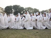 Catholic nuns from the Missionaries of Charity, the global order of nuns founded by Saint Mother Teresa, pray at a mass during the annual Co...