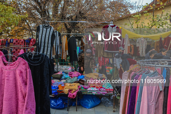 People buy warm clothes at a Sunday Market in Srinagar, Jammu and Kashmir, on November 24, 2024. 