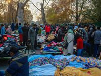 People buy warm clothes at a Sunday Market in Srinagar, Jammu and Kashmir, on November 24, 2024. (