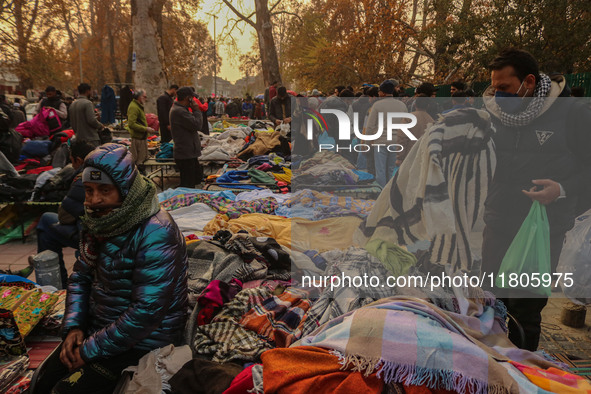 People buy warm clothes at a Sunday Market in Srinagar, Jammu and Kashmir, on November 24, 2024. 