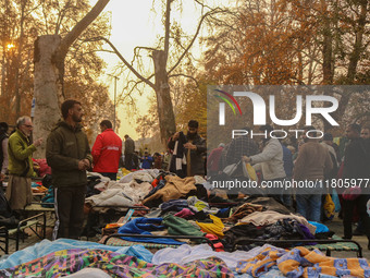 People buy warm clothes at a Sunday Market in Srinagar, Jammu and Kashmir, on November 24, 2024. (