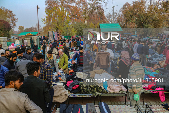 People buy warm clothes at a Sunday Market in Srinagar, Jammu and Kashmir, on November 24, 2024. 