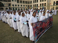 Catholic nuns from the Missionaries of Charity, the global order of nuns founded by Saint Mother Teresa, participate in the annual Corpus Ch...