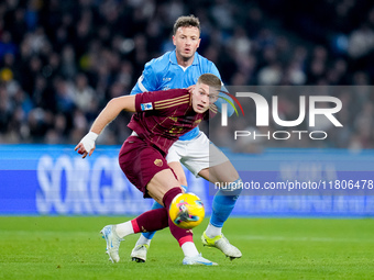 Amir Rrahmani of SSC Napoli and Artem Dovbyk of AS Roma compete for the ball during the serie Serie A Enilive match between SSC Napoli and A...