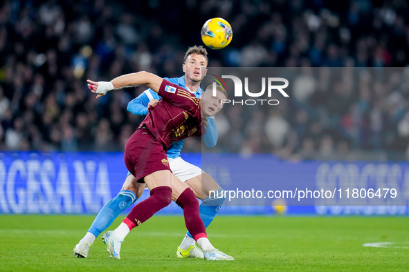 Artem Dovbyk of AS Roma and Amir Rrahmani of SSC Napoli compete for the ball during the serie Serie A Enilive match between SSC Napoli and A...