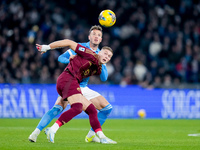 Artem Dovbyk of AS Roma and Amir Rrahmani of SSC Napoli compete for the ball during the serie Serie A Enilive match between SSC Napoli and A...