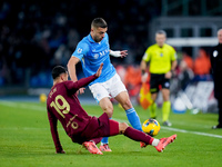 Zeki Celik of AS Roma and Alessandro Buongiorno of SSC Napoli compete for the ball during the serie Serie A Enilive match between SSC Napoli...