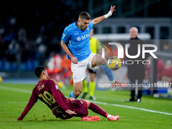 Zeki Celik of AS Roma and Alessandro Buongiorno of SSC Napoli compete for the ball during the serie Serie A Enilive match between SSC Napoli...