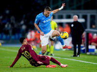 Zeki Celik of AS Roma and Alessandro Buongiorno of SSC Napoli compete for the ball during the serie Serie A Enilive match between SSC Napoli...