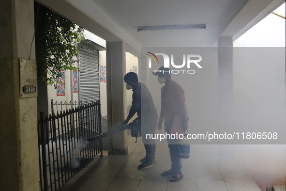 A man sprays insecticide to kill mosquitoes in Dhaka, Bangladesh, on November 24, 2024. At least eleven dengue patients die in the last 24 h...