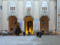 People enjoy the pre-Christmas atmosphere in the old town of Salzburg, Austria, on December 7, 2023. (