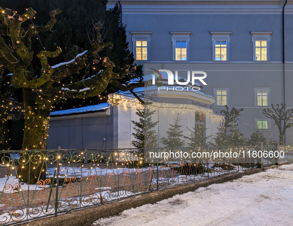 People enjoy the pre-Christmas atmosphere in the old town of Salzburg, Austria, on December 7, 2023. 