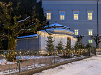 People enjoy the pre-Christmas atmosphere in the old town of Salzburg, Austria, on December 7, 2023. (