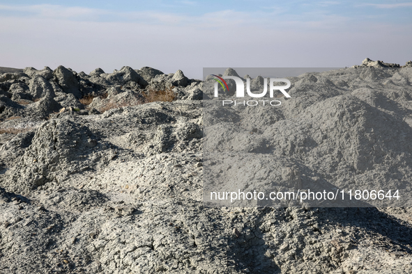 An austere, harsh landscape of dry mud left on mud volcano in Gobustan region near Baku, Azerbaijan on November 24, 2024. 