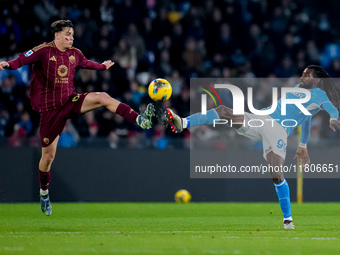 Niccolo' Pisilli of AS Roma and Andre-Frank Zambo Anguissa of SSC Napoli compete for the ball during the serie Serie A Enilive match between...