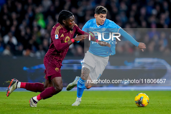 Mathias Olivera of SSC Napoli and Manu Kone' of AS Roma compete for the ball during the serie Serie A Enilive match between SSC Napoli and A...