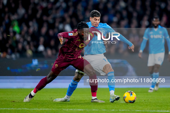 Mathias Olivera of SSC Napoli and Manu Kone' of AS Roma compete for the ball during the serie Serie A Enilive match between SSC Napoli and A...