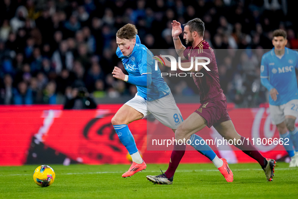 Scott McTominay of SSC Napoli and Bryan Cristante of AS Roma compete for the ball during the serie Serie A Enilive match between SSC Napoli...