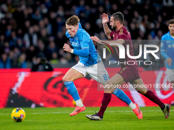 Scott McTominay of SSC Napoli and Bryan Cristante of AS Roma compete for the ball during the serie Serie A Enilive match between SSC Napoli...