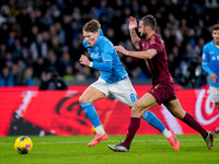 Scott McTominay of SSC Napoli and Bryan Cristante of AS Roma compete for the ball during the serie Serie A Enilive match between SSC Napoli...