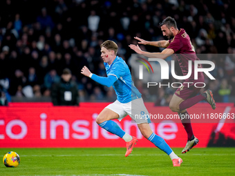 Scott McTominay of SSC Napoli and Bryan Cristante of AS Roma compete for the ball during the serie Serie A Enilive match between SSC Napoli...