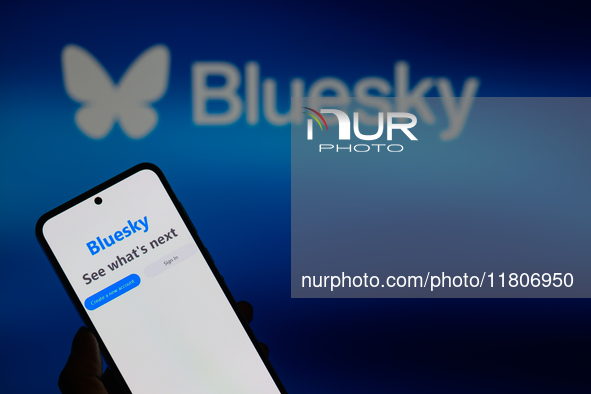 The Bluesky app displays on a smartphone with Bluesky visible in the background in this photo illustration in Brussels, Belgium, on November...