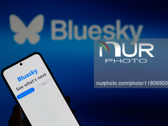 The Bluesky app displays on a smartphone with Bluesky visible in the background in this photo illustration in Brussels, Belgium, on November...