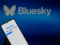 The Bluesky app displays on a smartphone with Bluesky visible in the background in this photo illustration in Brussels, Belgium, on November...