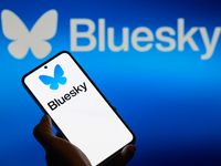 The Bluesky logo appears on a smartphone with Bluesky visible in the background in this photo illustration in Brussels, Belgium, on November...