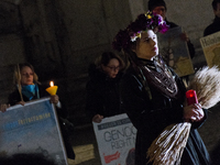 Ukrainian citizens participate in a torchlight procession in Capitol Square to commemorate the victims of the Holodomor 1932-1933, symbolizi...