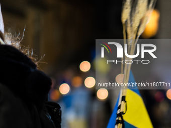 Ukrainian citizens participate in a torchlight procession in Capitol Square to commemorate the victims of the Holodomor 1932-1933, symbolizi...