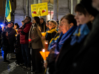 Ukrainian citizens participate in a torchlight procession in Capitol Square to commemorate the victims of the Holodomor 1932-1933, symbolizi...