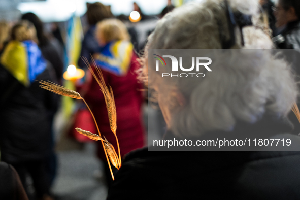 Ukrainian citizens participate in a torchlight procession in Capitol Square to commemorate the victims of the Holodomor 1932-1933, symbolizi...