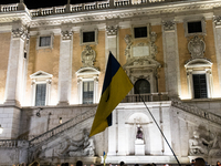 Ukrainian citizens participate in a torchlight procession in Capitol Square to commemorate the victims of the Holodomor 1932-1933, symbolizi...