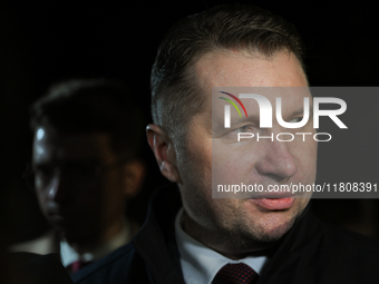 KRAKOW, POLAND - NOVEMBER 24:
Przemyslaw Czarnek, Law and Justice party MP, speaks to the media as he leaves the venue where Karol Nawrocki...