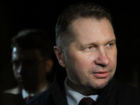 KRAKOW, POLAND - NOVEMBER 24:
Przemyslaw Czarnek, Law and Justice party MP, speaks to the media as he leaves the venue where Karol Nawrocki...