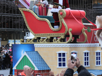 A person dressed as Santa Claus participates in the annual Santa Claus Parade in Toronto, Ontario, Canada, on November 24, 2024. Thousands o...