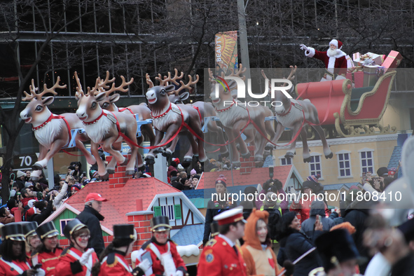 A person dressed as Santa Claus participates in the annual Santa Claus Parade in Toronto, Ontario, Canada, on November 24, 2024. Thousands o...