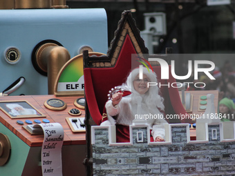 A person dressed as Mrs. Claus participates in the annual Santa Claus Parade in Toronto, Ontario, Canada, on November 24, 2024. Thousands of...