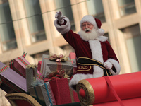 A person dressed as Santa Claus participates in the annual Santa Claus Parade in Toronto, Ontario, Canada, on November 24, 2024. Thousands o...