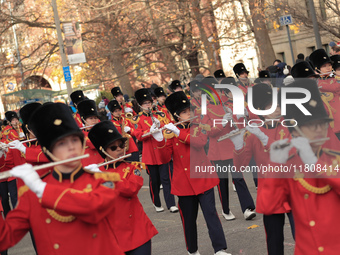 Participants take part in the annual Santa Claus Parade in Toronto, Ontario, Canada, on November 24, 2024. Thousands of people line the stre...