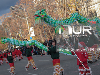 Participants take part in the annual Santa Claus Parade in Toronto, Ontario, Canada, on November 24, 2024. Thousands of people line the stre...