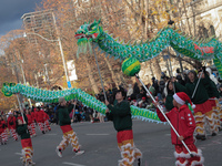 Participants take part in the annual Santa Claus Parade in Toronto, Ontario, Canada, on November 24, 2024. Thousands of people line the stre...