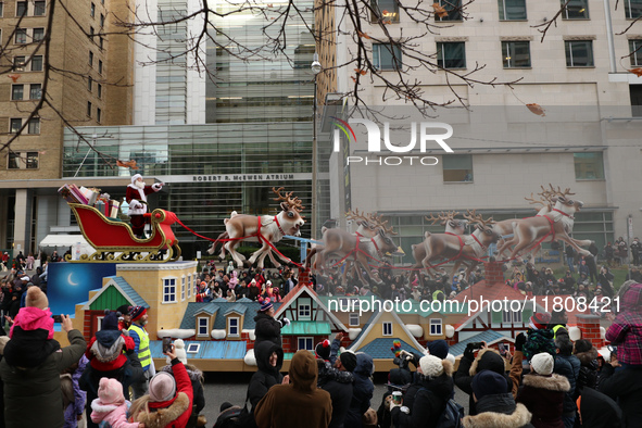 A person dressed as Santa Claus participates in the annual Santa Claus Parade in Toronto, Ontario, Canada, on November 24, 2024. Thousands o...