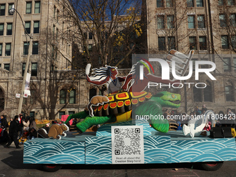 Participants take part in the annual Santa Claus Parade in Toronto, Ontario, Canada, on November 24, 2024. Thousands of people line the stre...